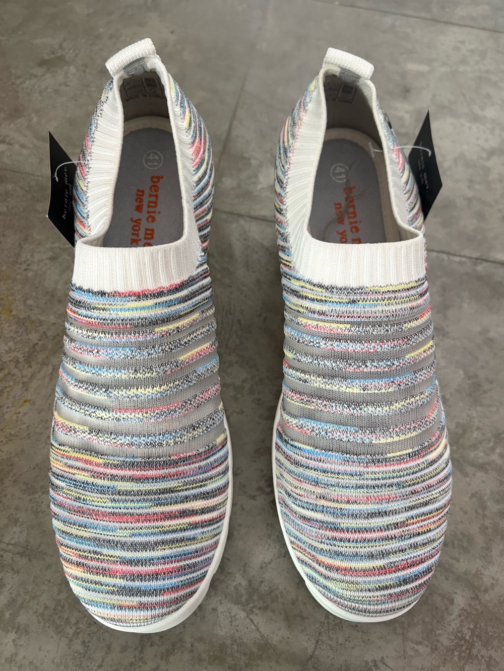 Bernie Mev Solange slip-on wedge shoes in a multi-color rainbow knit.